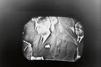 (TELEVISION) Pair of small-format albums with nearly 80 snapshots made of a television screen in the aftermath of John F. Kennedys ass